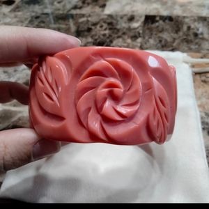 Carved coral color resin bracelet